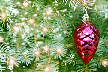 Christmas toy pine cone on the tree