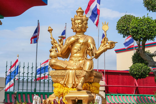 Golden Brahma statue.