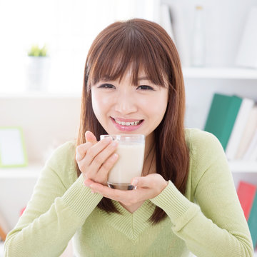 Asian Female Drinking Soy Milk