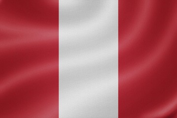 Obraz premium Peru flag on the fabric texture background