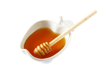 image of honey glass jar. traditional holiday symbols.
