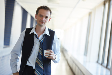 businessman with cup of coffee during a break