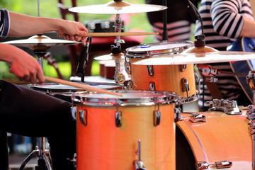 Musician playing the drums at the concert