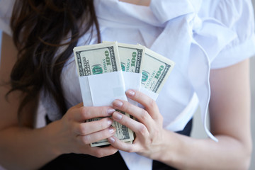 Money close-up in women's hands
