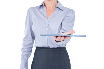 Businesswoman holding digital tablet