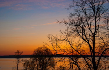 Fototapeta na wymiar dawning over Lake Seliger. Silhouettes.