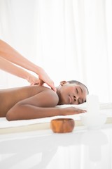 Obraz na płótnie Canvas Pretty woman enjoying a massage