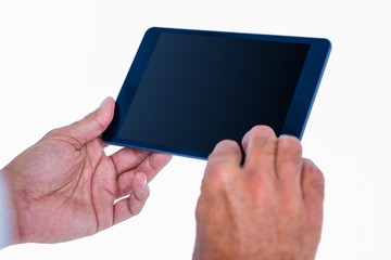 Hand of man touching tablet computer 