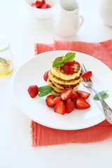 stack cheese pancakes with strawberry