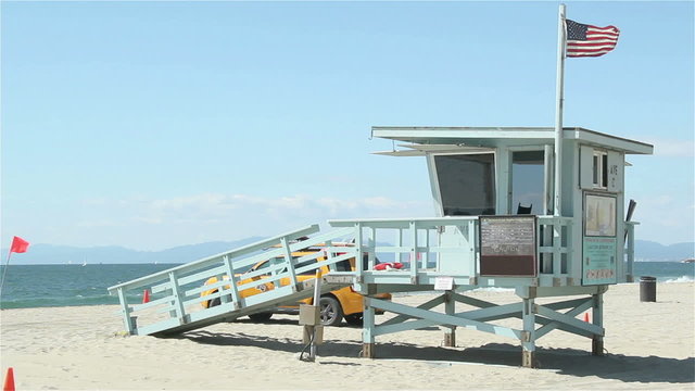US Lifeguard Tower near Venice beach, United States flag is raised, beach is empty