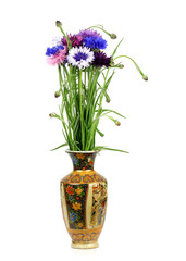 bouquet of cornflowers in a porcelain vase