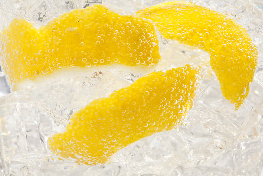 Soda with lemon peels