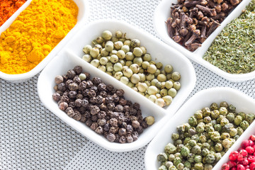 Colorful herbs,spices and aromatic ingredients on modern table.