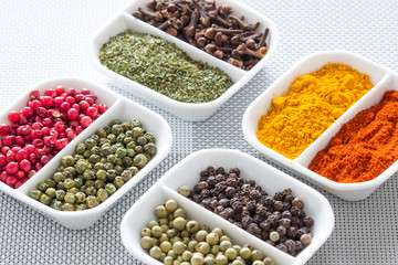Colorful herbs,spices and aromatic ingredients on modern table.