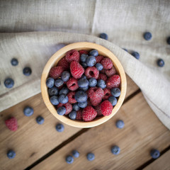 nice fresh berries on wooden background