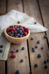 nice fresh berries on wooden background