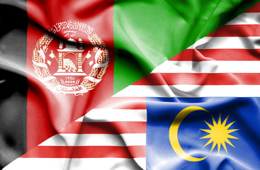 Waving flag of Malaysia and Afghanistan