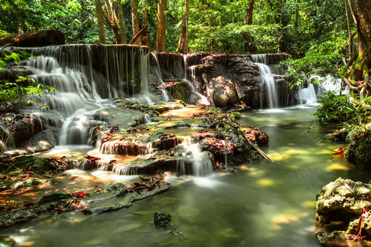 Fototapeta Waterfall in deep tropical forest of Thailand.
