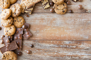 close up of candies, chocolate, muesli and cookies