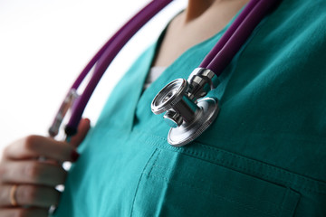 Doctor hand holding a stethoscope listening to heartbeat