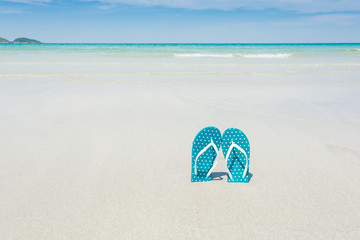 Beach, slippers on tropical beach