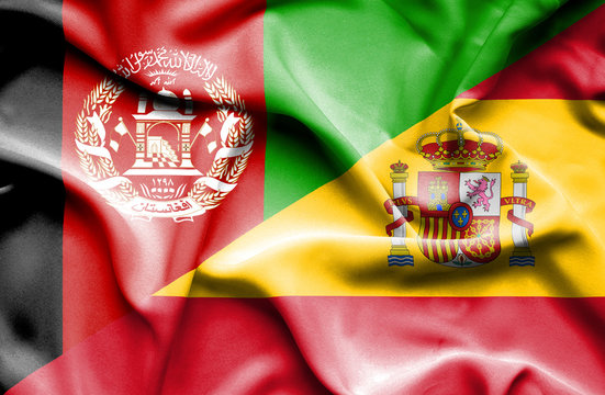 Waving flag of Spain and Afghanistan