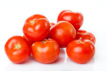 fresh tomatoes isolated on white background