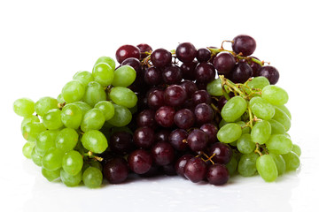 Black and white grapes isolated on white background