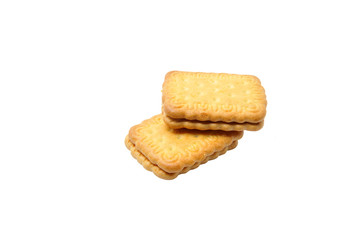 Biscuits with butter cream over white background.