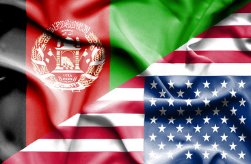 Waving flag of United States of America and Afghanistan