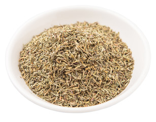 Dried thyme herbs in white bowl over white background