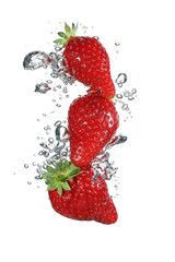 Strawberry falling into water