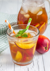 Glass of refreshing homemade nectarine iced tea
