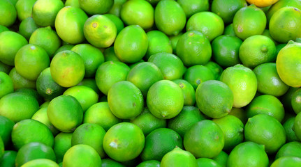 Limes for sale at outdoor market
