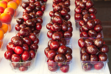 Display of cherries ready to eat at a market.