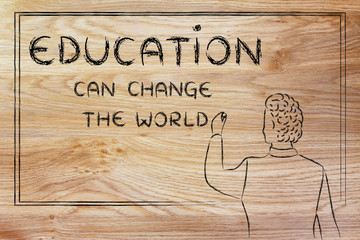 teacher writing on blakboard: education can change the world