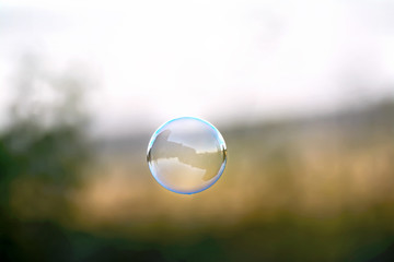 Soap bubble on the background