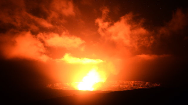  Astrophotography time lapse footage with zoom in motion of stars over active Halemaumau Crater of Kilauea Volcano in Hawaii Volcanoes National Park, Hawaii