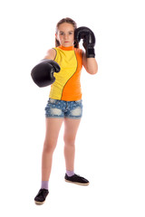 Young boxer girl on white studio background