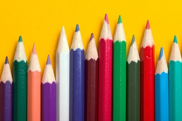 thick colored pencils against a white background color