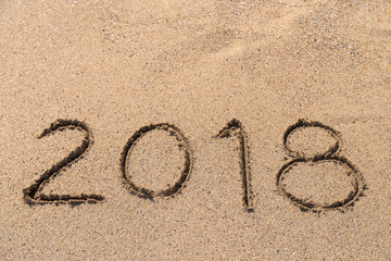 Year 2018 Written On Beach Sand