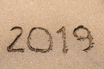 Year 2019 Written On Beach Sand
