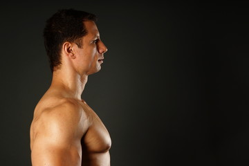 Profile of muscular man, right you can write some text