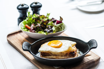 Breakfast menu with beautiful fried eggs and bread