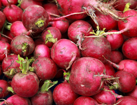 red beet roots, background, some vegetables in focus