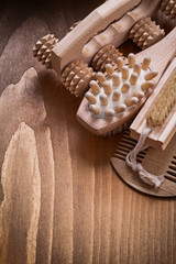Scrubbing brush wooden comb and peeling massagers on pine vintag