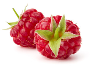 ripe raspberries isolated on white background close up