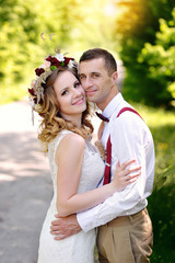 Bride and Groom at wedding Day walking Outdoors