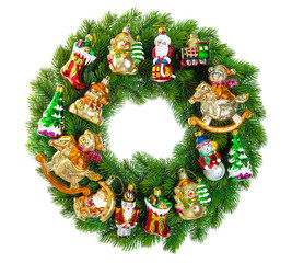 Fototapeta na wymiar Christmas wreath decorated with ornaments, baubles and vintage t