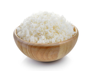 rice in wood bowl on white background